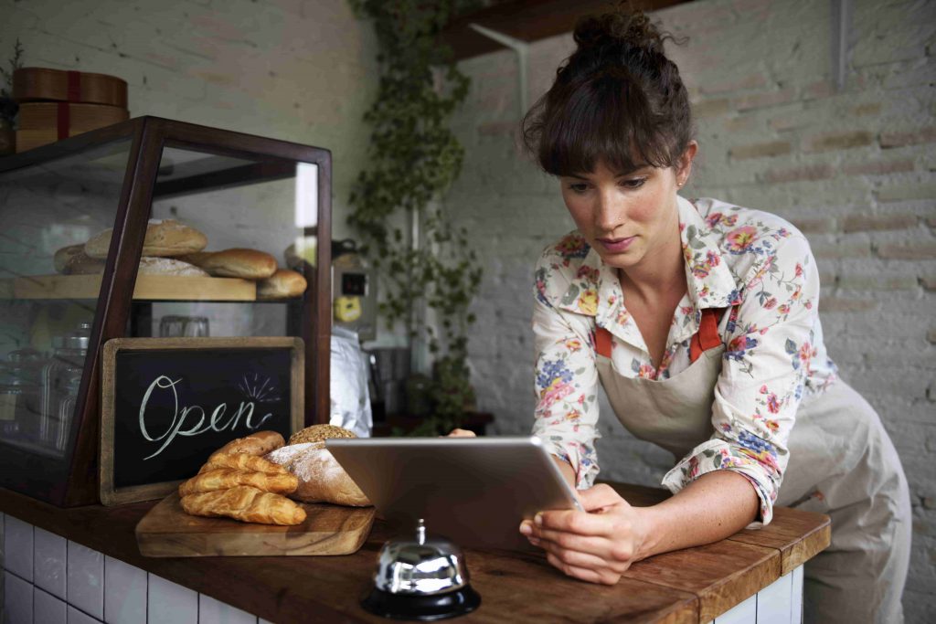 business owner using tablet